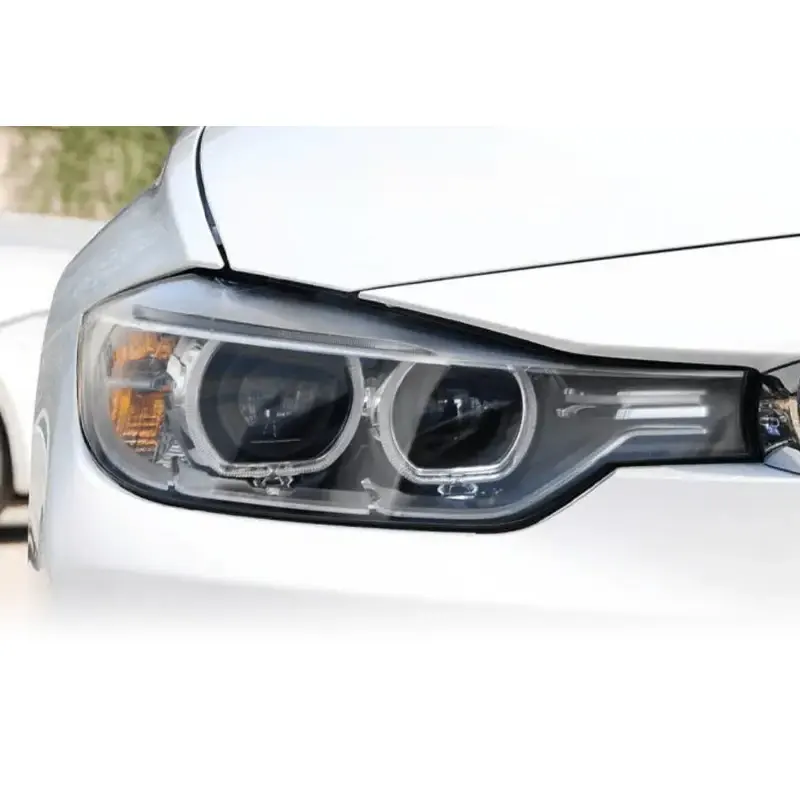 BMW 3 Series F30 factory bi-xenon headlight with projector lenses and LED corona rings