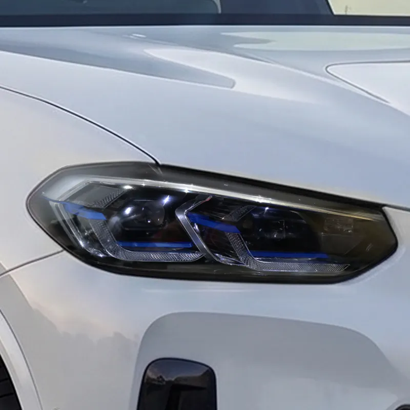 BMW X3 / X4 / X3 M / X4 M LCI Laserlight headlight — 'BMW Laser' lettering on the DRL trim