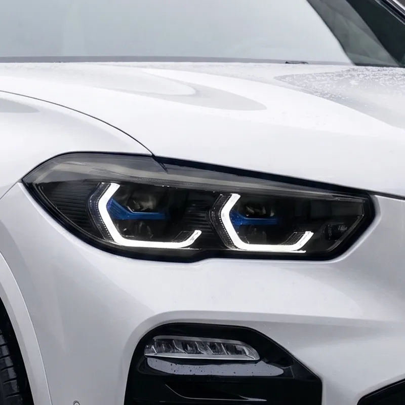 BMW X5 G05 pre-LCI Laserlight headlight with blue accents — the DRL these modules replace