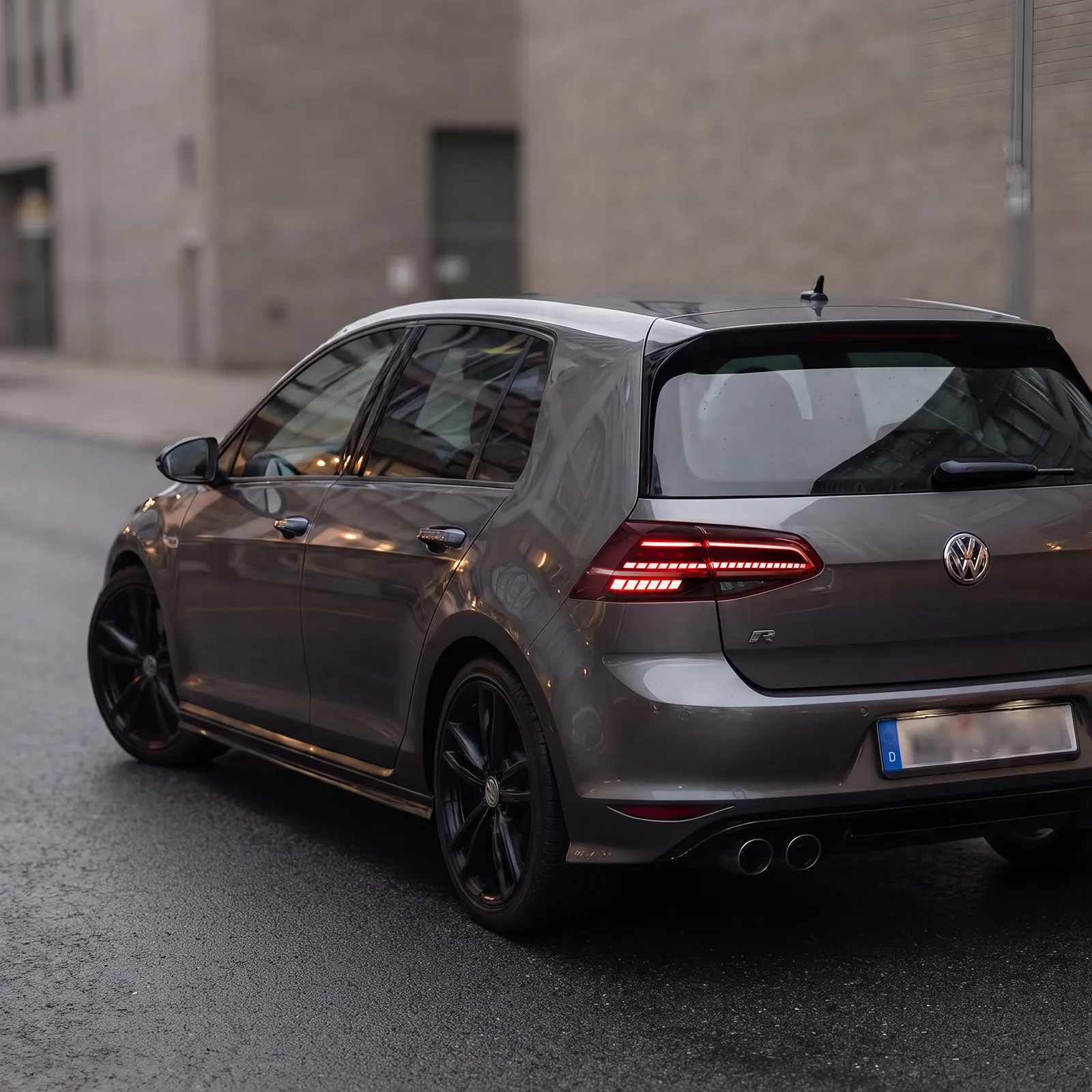 VW Golf Mk7 with GTI R-style LED taillights installed — Mk7.5 facelift full-width signature